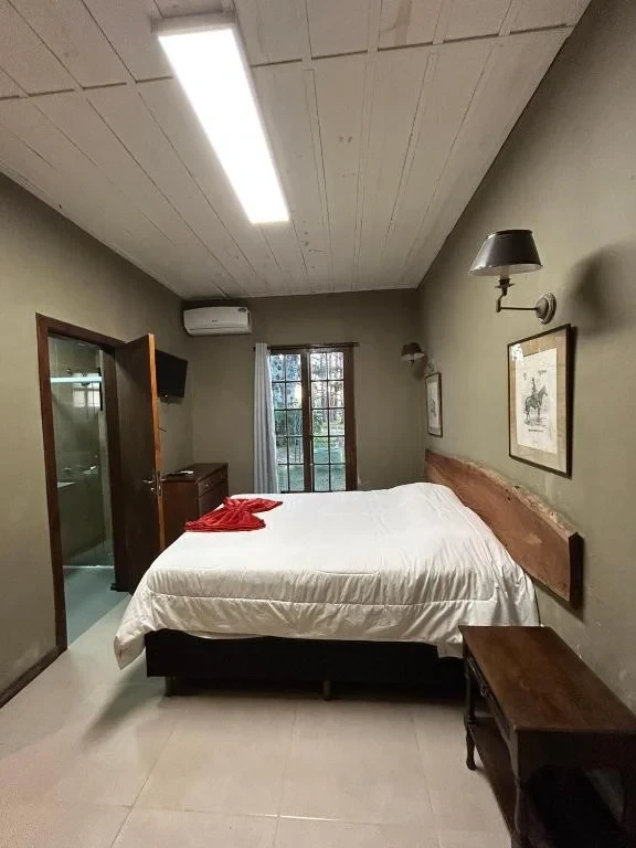 Suíte Júnior: fotografia do quarto na referência fornecida