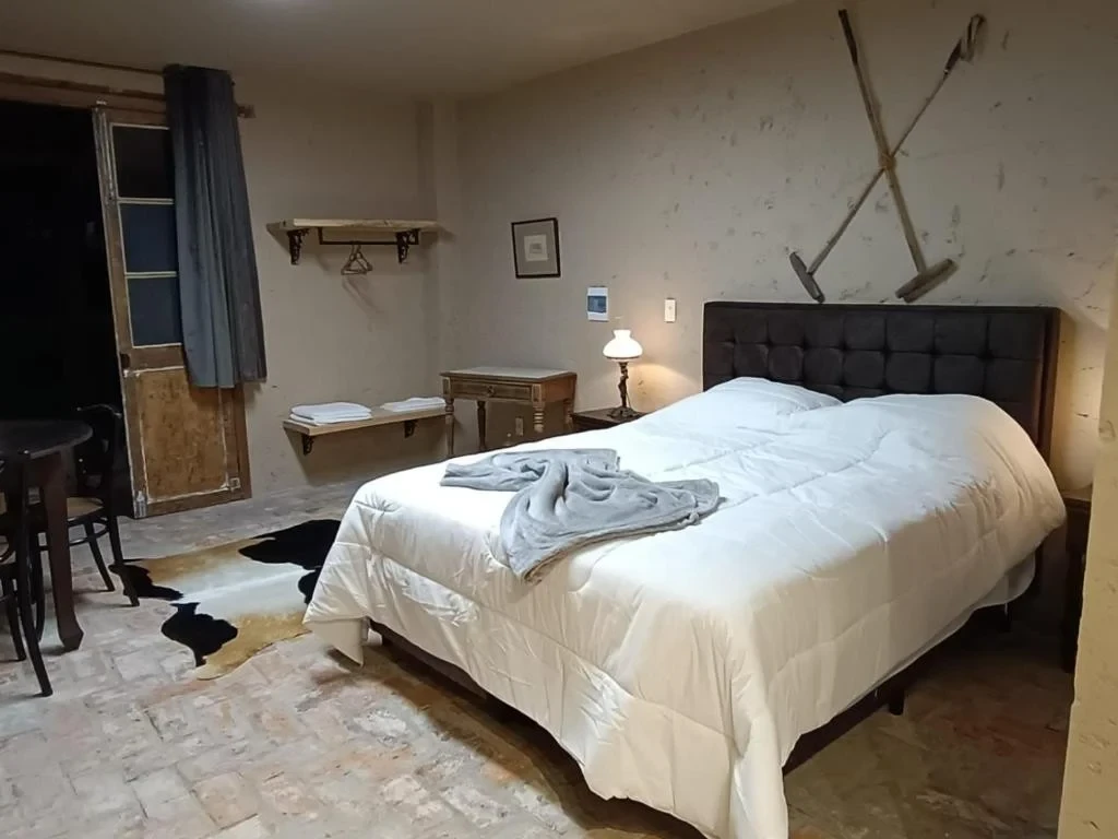 Suíte King Deluxe: fotografia do quarto na referência fornecida